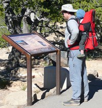 Hiker-w-baby-in-backpack