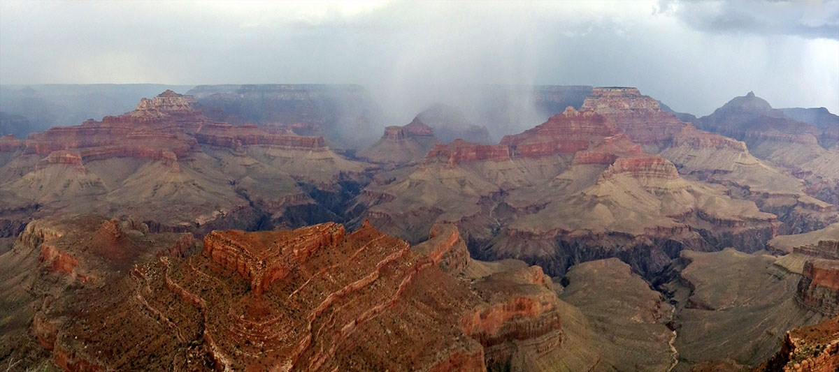 A summer storm passes over the canyon.
