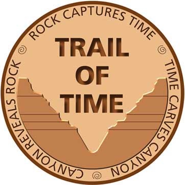 Logo within a circle, Centered text, Trail of Time, with text around circumference reading: Rock Captures Time, Time Carves Canyon, Canyon Reveals Rock.