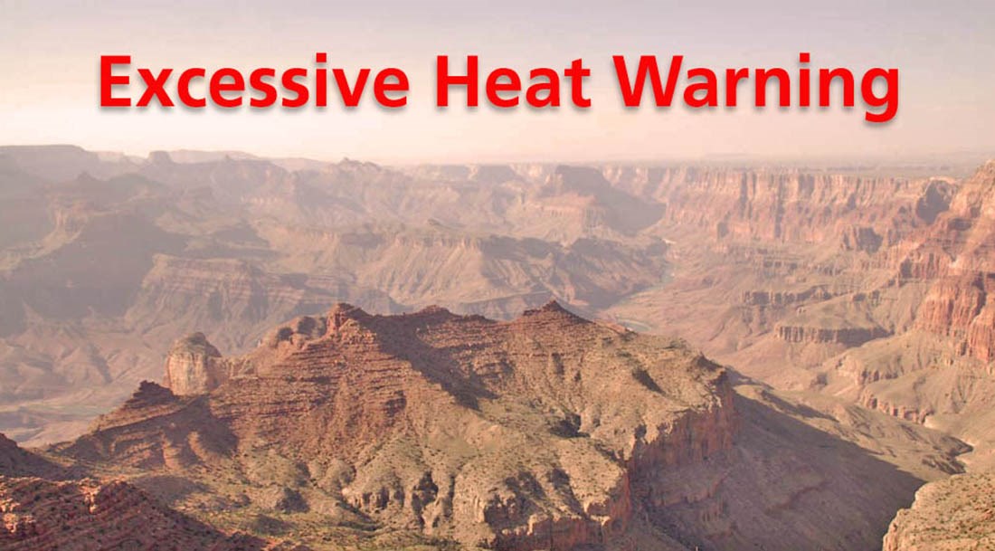 a hazy landscape photo of Grand Canyon with a mountain in the foreground surrounded by canyon walls. Text reads: Excessive Heat Warning