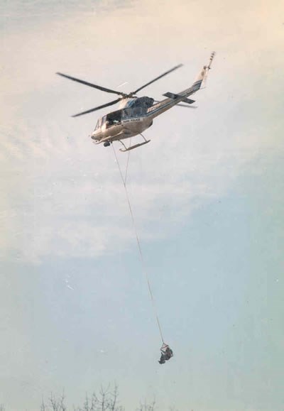 A person being rescued by the U.S. Park Police helicopter