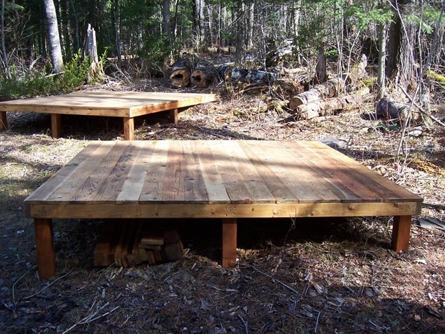 Wooden decks at Fort Charlotte campgrounds for tents.