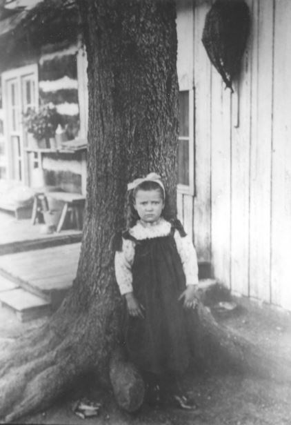 Julia Virginia Herard stands near her family's homestead near the Great Sand Dunes in 1892.