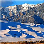 Snowy Dunes and Mountains