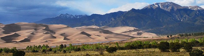 Panoramic Dunes and Mountains