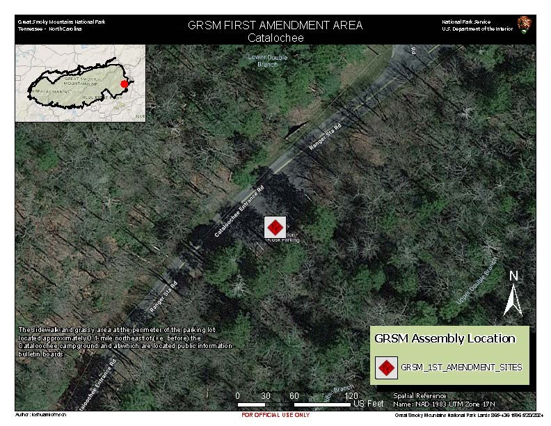 Cataloochee 1st Amendment Area map. Red diamond in white square on sidewalk and grassy area at perimeter of parking lot approximately 0.1 mile NE of (before) Cataloochee campground, by bulletin boards. Inset park map in corner. Scale: 120 ft