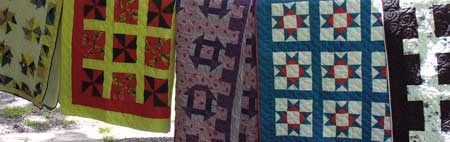 Colorful quilts displayed at Cosby in the Park.