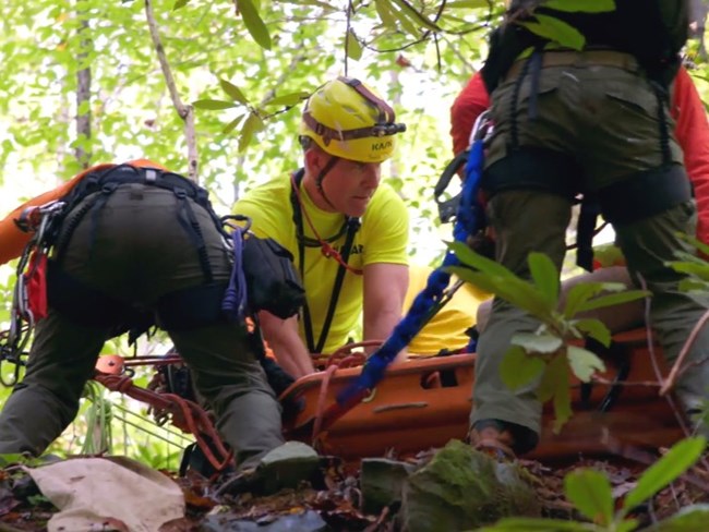 Park rangers engaging in search and rescue efforts