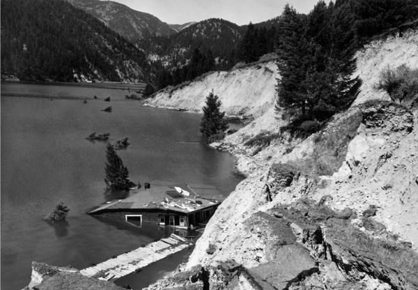 House half submerged in Hebgen Lake as a result of the 1959 Hebgen Lake Earthquake