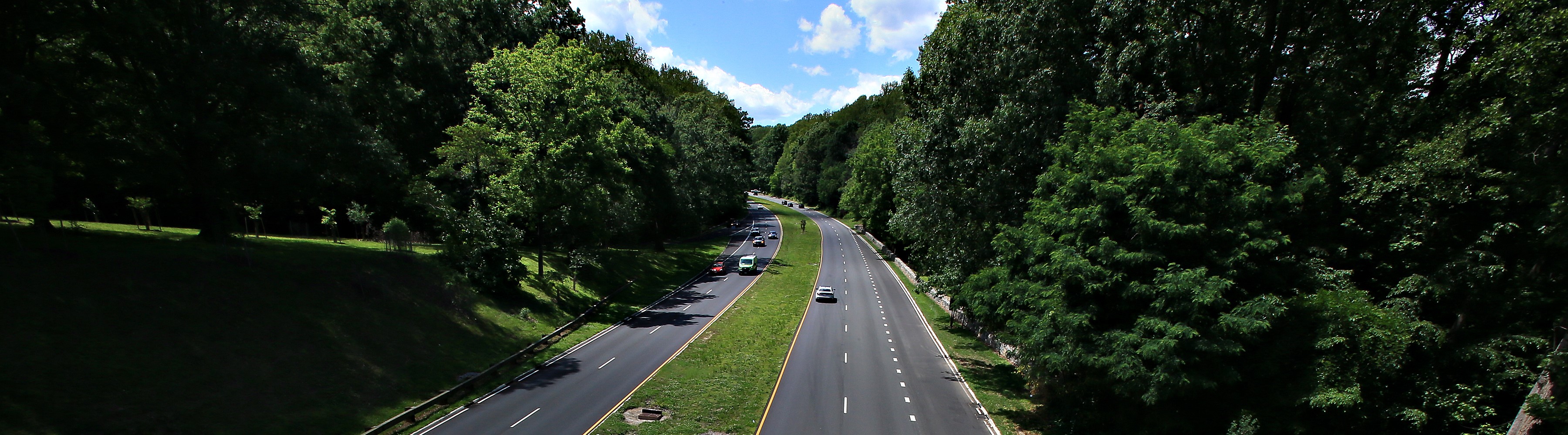 A parkway surrounded by trees.
