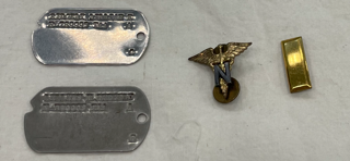 Lillian's dog tags, Army Nurse Corp insignia, her rank