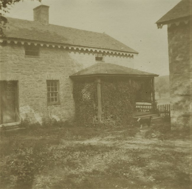 Stone Structures on the home farm of Hampton originally built as Quarters for the enslaved, this photo was taken while the buildings were occupied by tenant families, c. 1895, NPS.