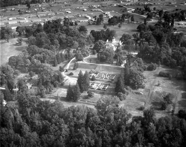 This is a picture taken by U.S., Naval Air Station, Patuxent River, MD in 1955. It is an aerial view of Hampton Lane in 1955, during the time Hampton Lane was developing more.