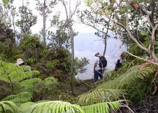Hiker looking into the crater