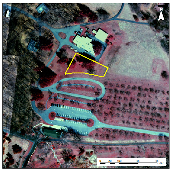 Area view of Hopewell Furnace Parking lots, orchard and bildings. A yellow polygon outlines the area north of the upper parking lot, south of the building and east of the orchard.