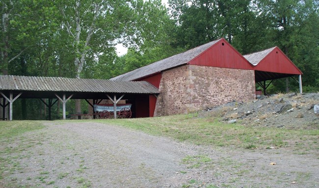 Stone shed housed charcoal, the fuel used at Hopewell Furnace.