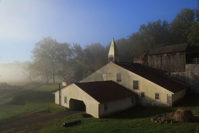 The Cast House surrounded by fog