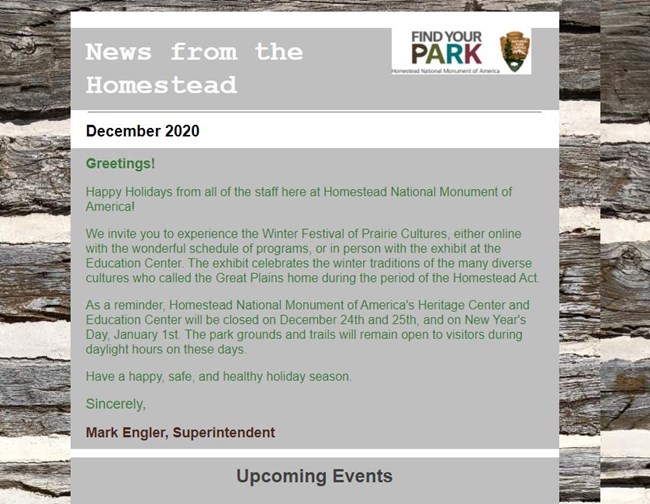 newsletter text with close up of a log cabin in the background