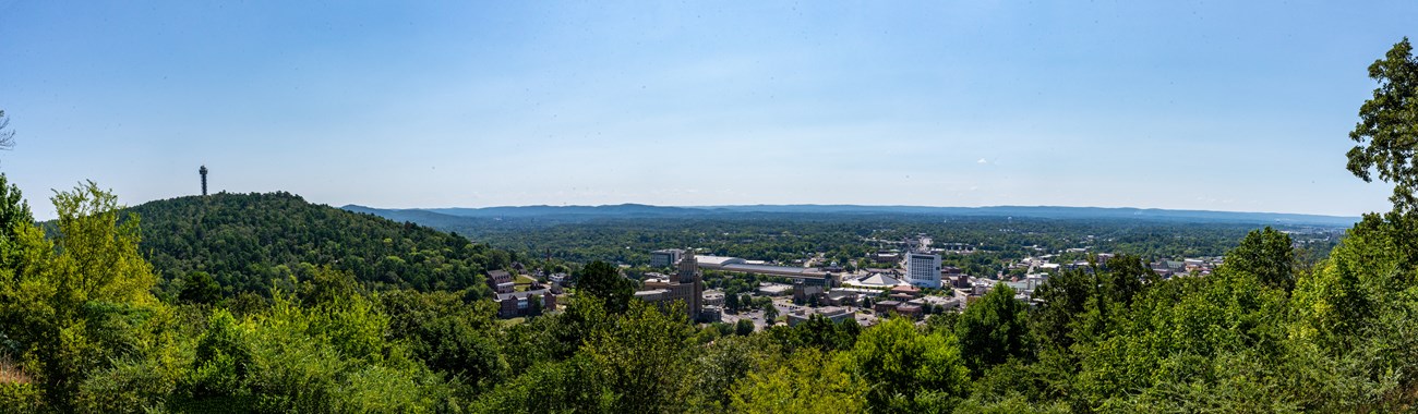 A panoramic view from up on West Mountain with downtown Hot Springs in view along with the mountain tower