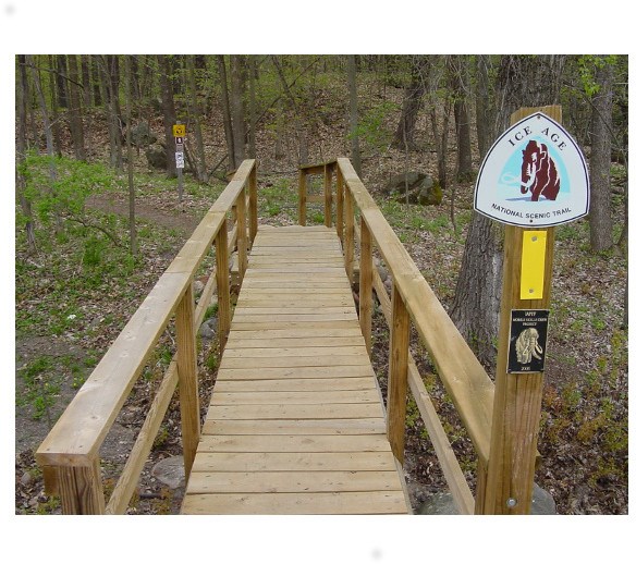 Ice Age Trail markers and bridge along Blueberry Segment.