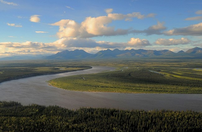 The Kobuk River meandering with the Brooks Range in the background.