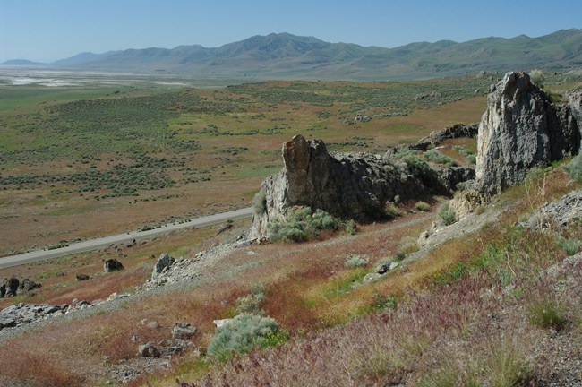 Mountain ridge extending into a semi-arid basin near Great Salt Lake