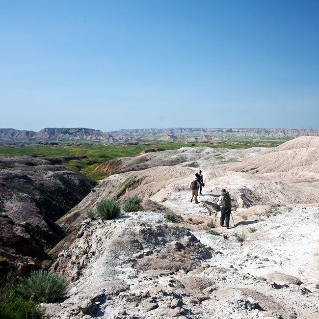 Three biologists trek across barren land of the badlands