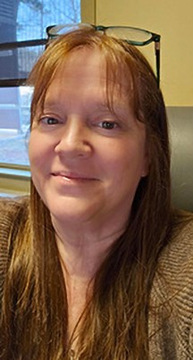 Woman smiling in an office