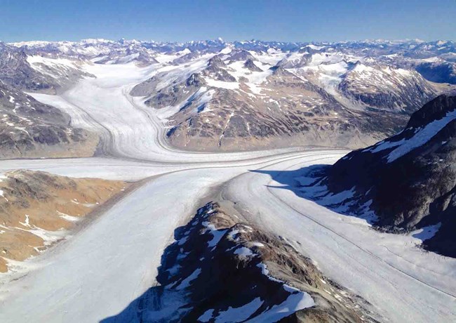 The confluence of four separate glaciers in Lake Clark.