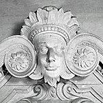 Scrolled pediment detail above the Assembly Room doorway.