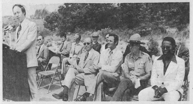 Congressman Floyd Fithian stands at a podium in an historic photograph from West Beach's ribbon-cutting ceremony.