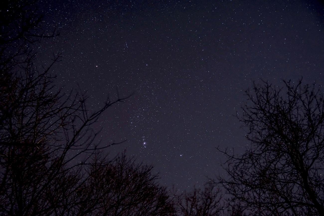 Dark, starry night over Lake Michigan