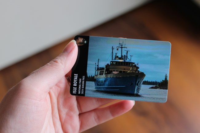 A close up of the Isle Royale 2024 Season Pass with the Ranger 3 on the front.