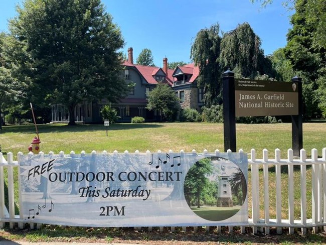 fence banner advertising summer concerts
