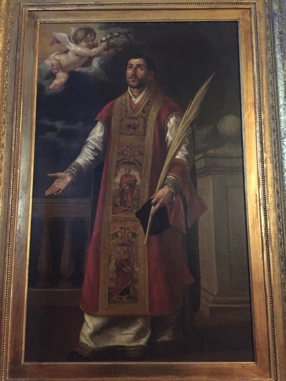 a painting of a saint that has his arms facing toward earth and he is looking skyward