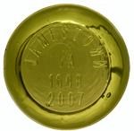 Circular glass paper weight with text: Jamestown VA 1608-2007