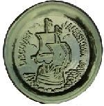 Circular green glass paper weight with the image of a sailing ship and the text: DISCOVER JAMESTOWN