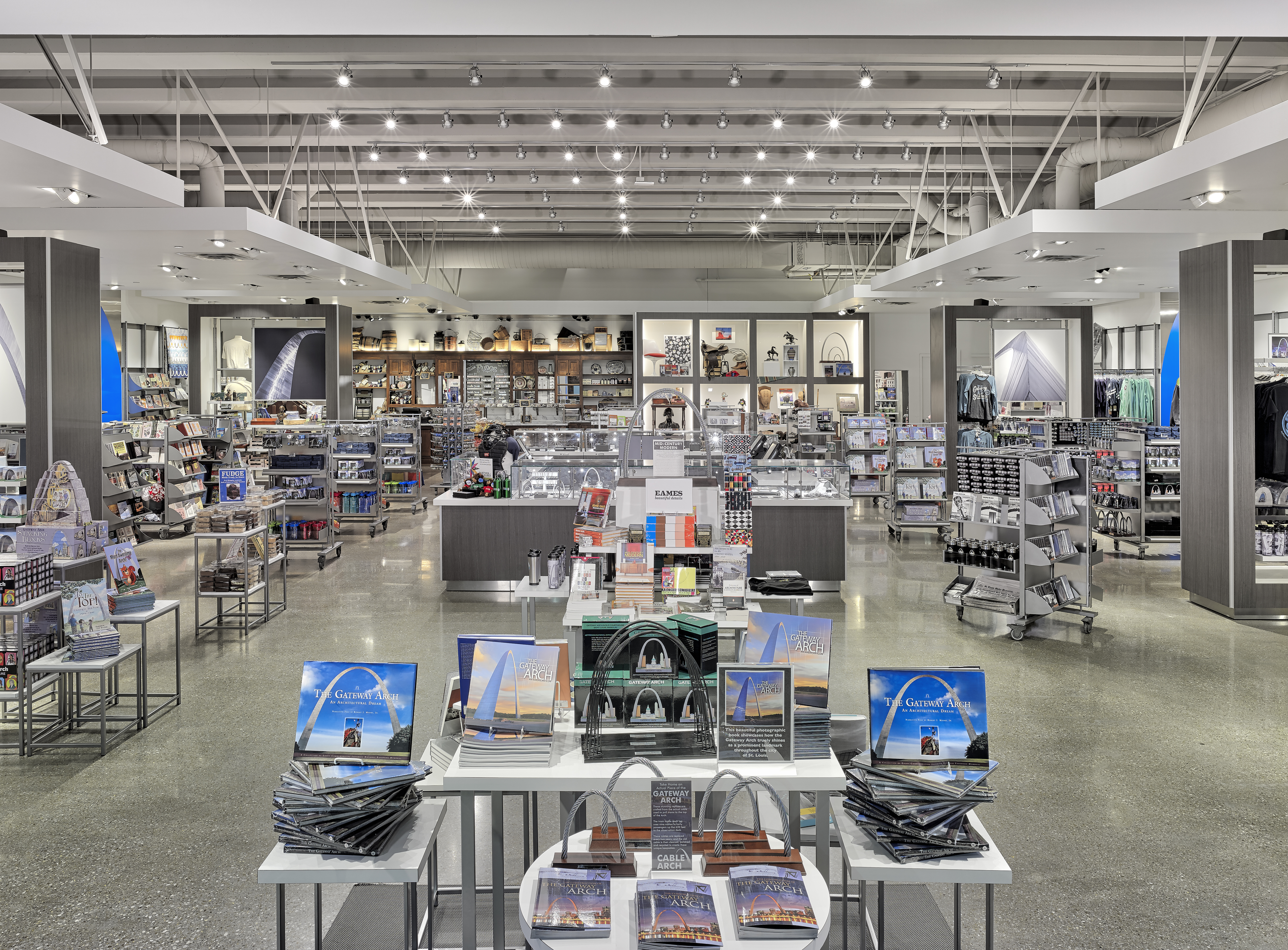 tables and racks of sales merchandise in the Arch store