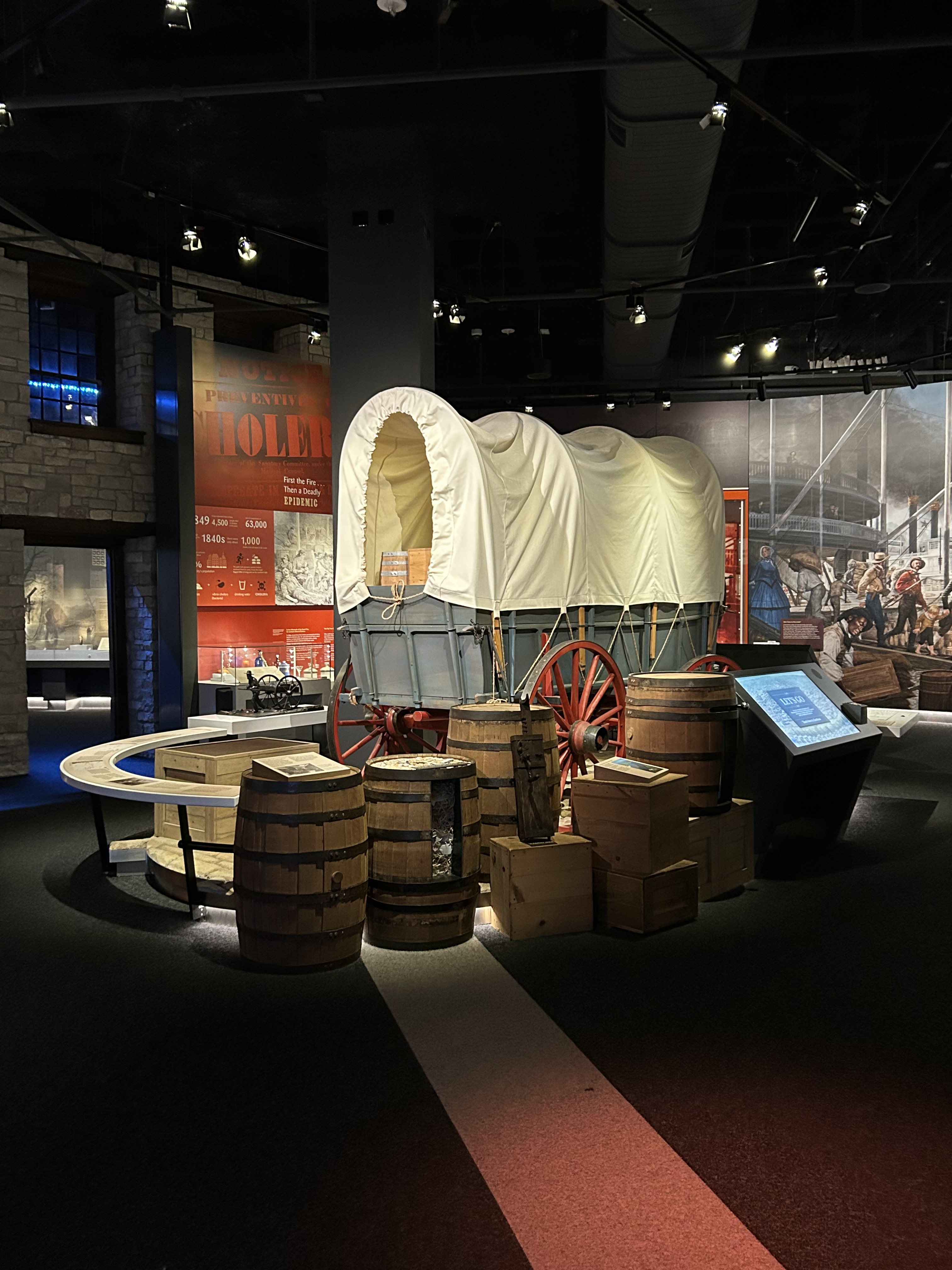 A covered wagon in a museum