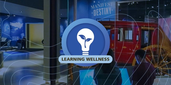 a circular blue graphic with a lightbulb containing a plant in the center and the words Learning Wellness, graphic is on top of blue tinted photo of the stagecoach area of the museum and has squiggly lines across the bottom