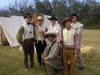 Image of young men dressed as Tennessee volunteers at the 1815 Battle of New Orleans