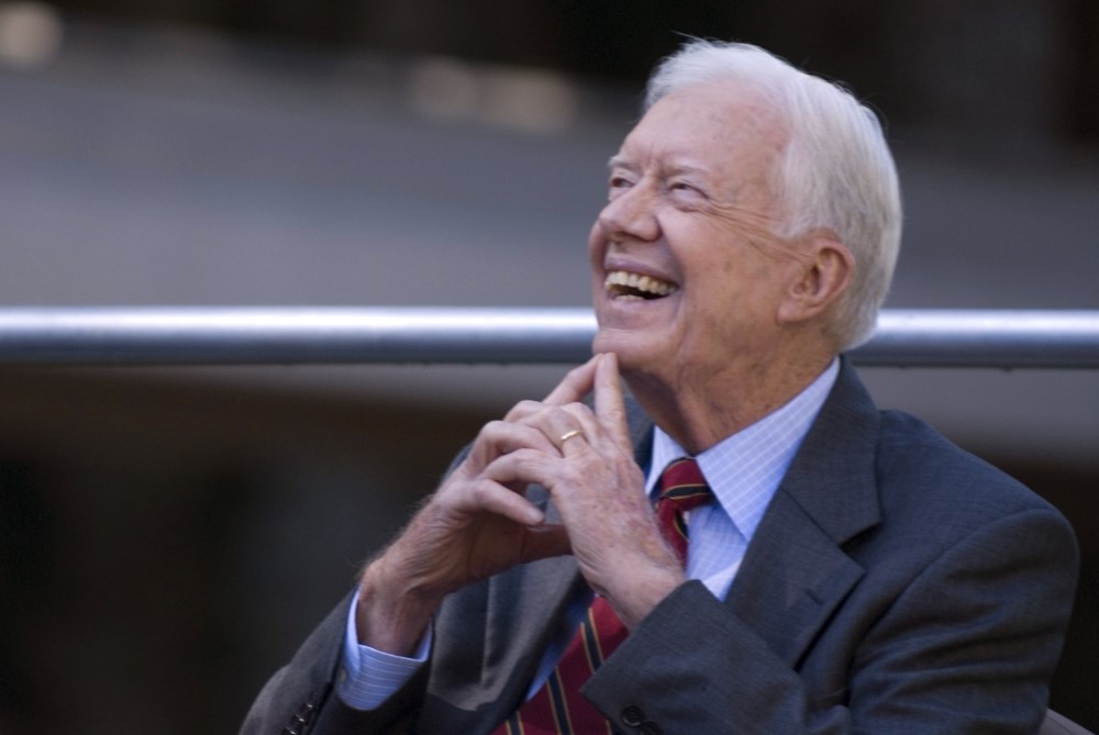 Photo of Jimmy Carter looking up while smiling