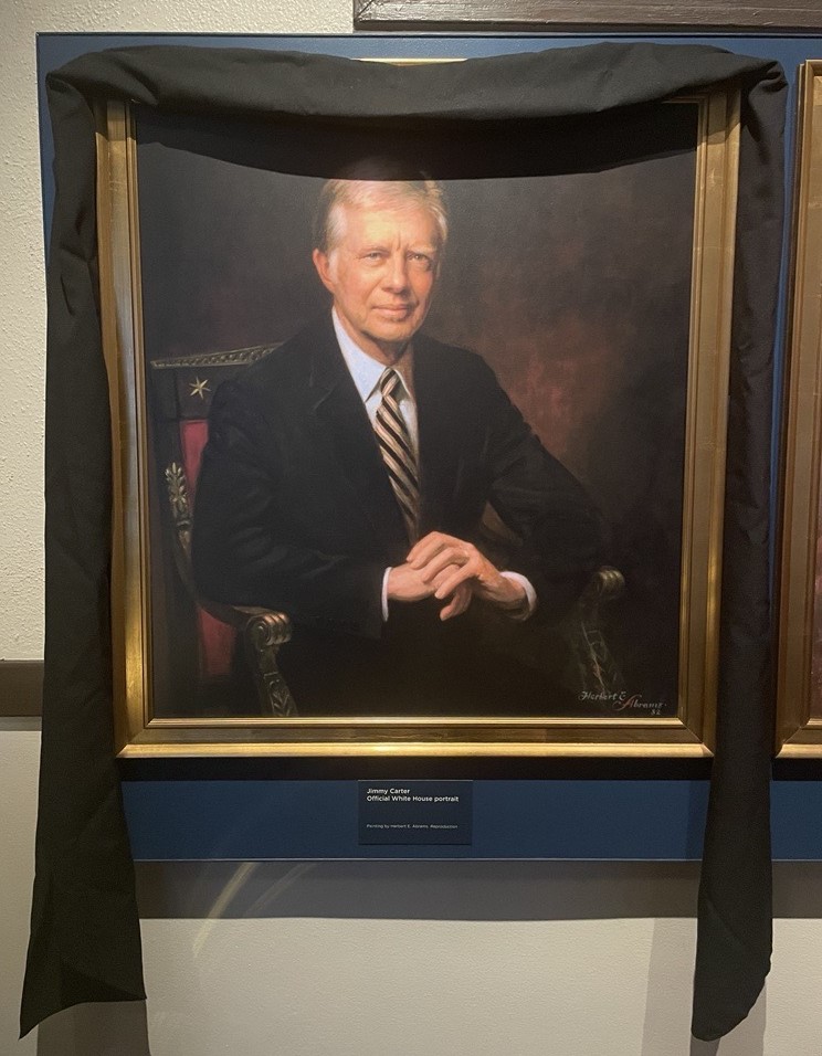 Portrait of President Jimmy Carter shrouded in black