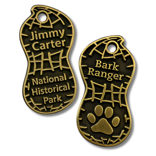 Jimmy Carter National Historical Park BARK Ranger pet tag shaped like a peanut.