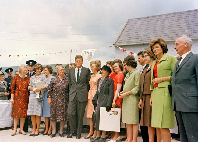 JFK in the middle of a crowd