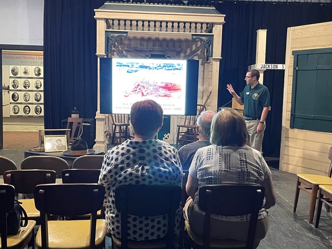 People listen to a talk