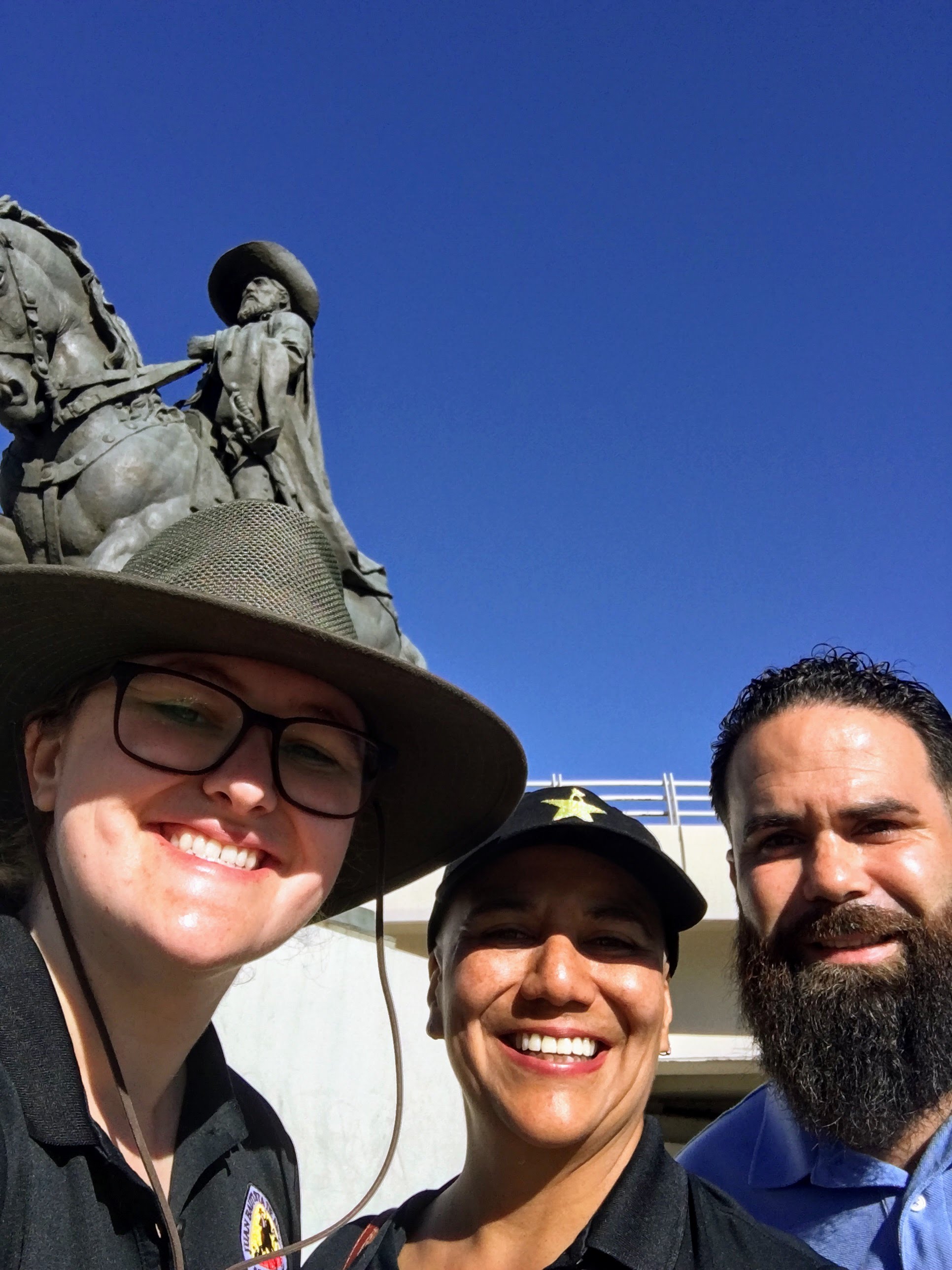 The Anza Trail Staff in front of a statue of Anza in Hermosillo, Sonora, Mexico.