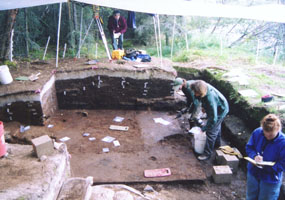 Archeologists work at an eroding site in the Brooks River area.