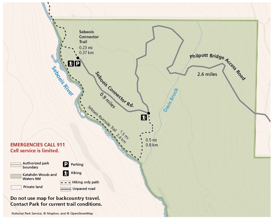 A colored map with graphic elements that point out hiking and parking areas by the Seboeis Riverside Trail in the Seboeis Parcel.