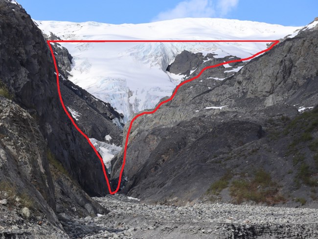 Exit glacier pictured with red outline around lower portion.